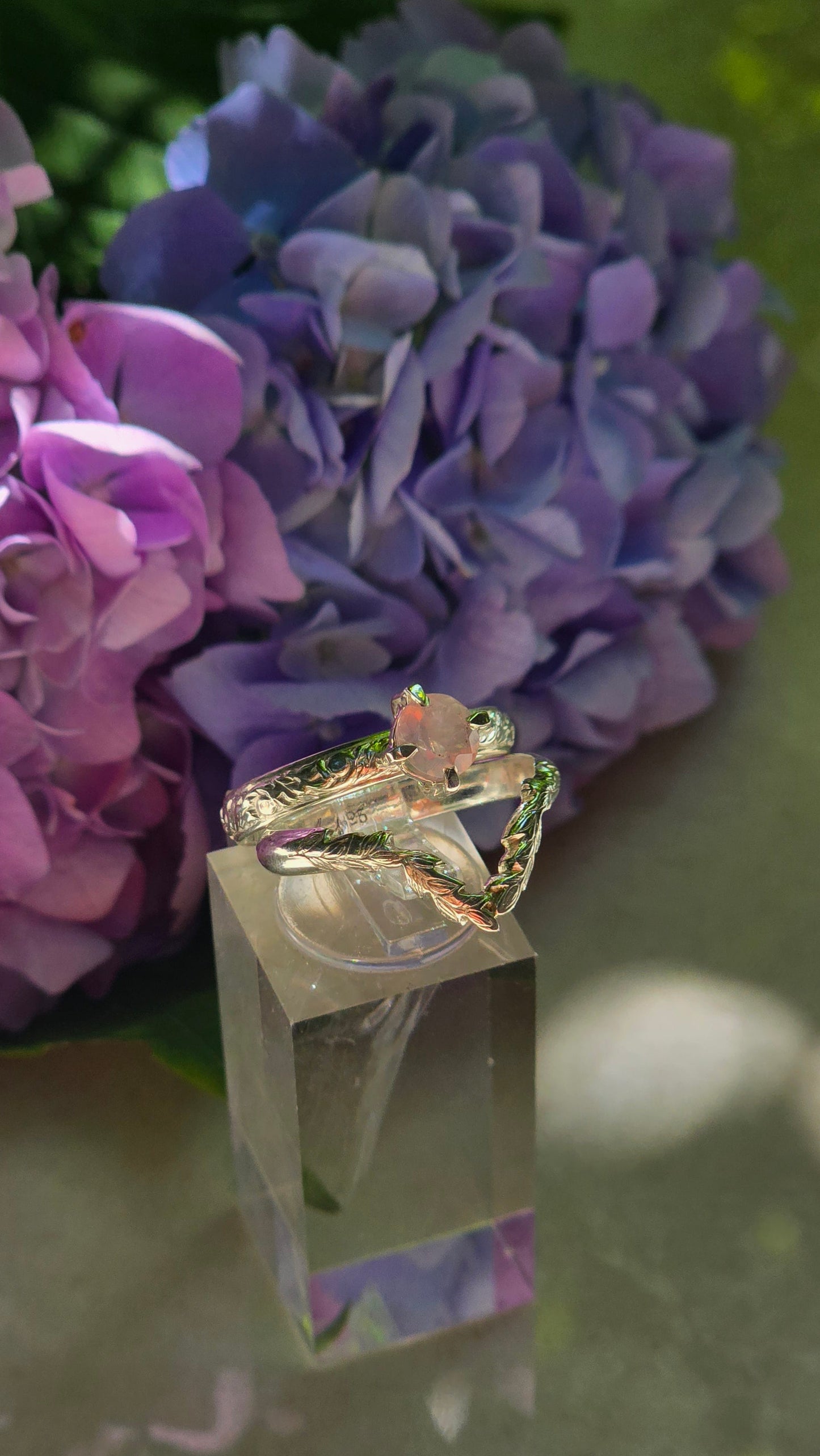 Handcrafted sterling silver Bloom & Vine stacking ring set featuring a genuine prong-set rose quartz gemstone with a matching vine-inspired chevron stacking band by Vanessa Andrea Jewellery.