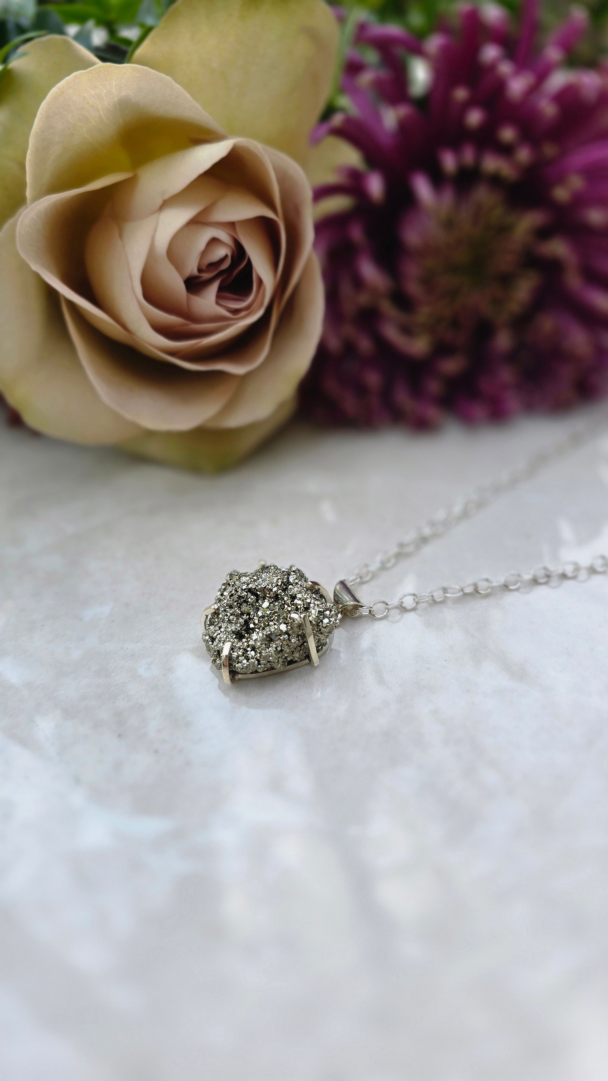 Sterling silver prong-set raw pyrite pendant on 22 inch chain