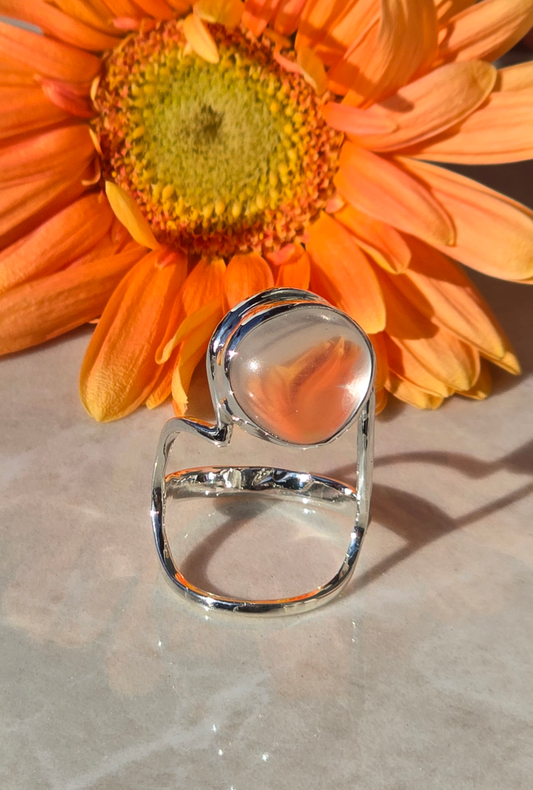Sterling silver size 6 heart ring with angled thin wire design and bezel-set clear quartz accent