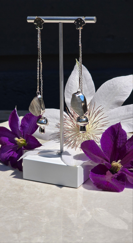 Sterling silver mushroom stud earrings with two dangling charms: bezel-set open-back grey moonstone and sandcasted mushroom
