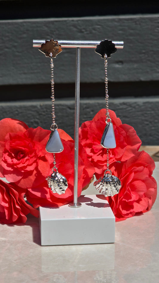 Sterling silver earrings with seashell stud, bezel-set blue lace agate, and dangling sandcasted seashell charm