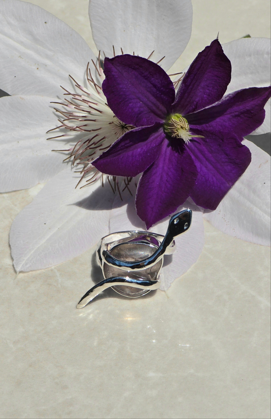 Sterling silver size 10.5 snake ring with bezel-set tumbled smoky quartz stone wrapped by serpent design