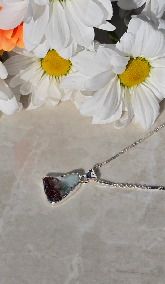 Sterling silver bezel-set chrysoprase pendant with natural brown and blue tones on 18 inch chain