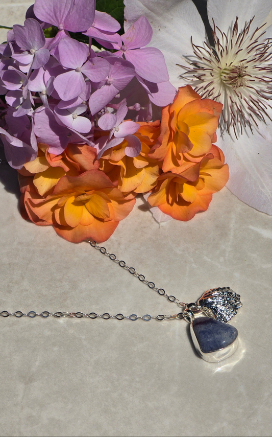 Sterling silver necklace with bezel-set dumortierite and sandcasted seashell charms on 19-inch chain