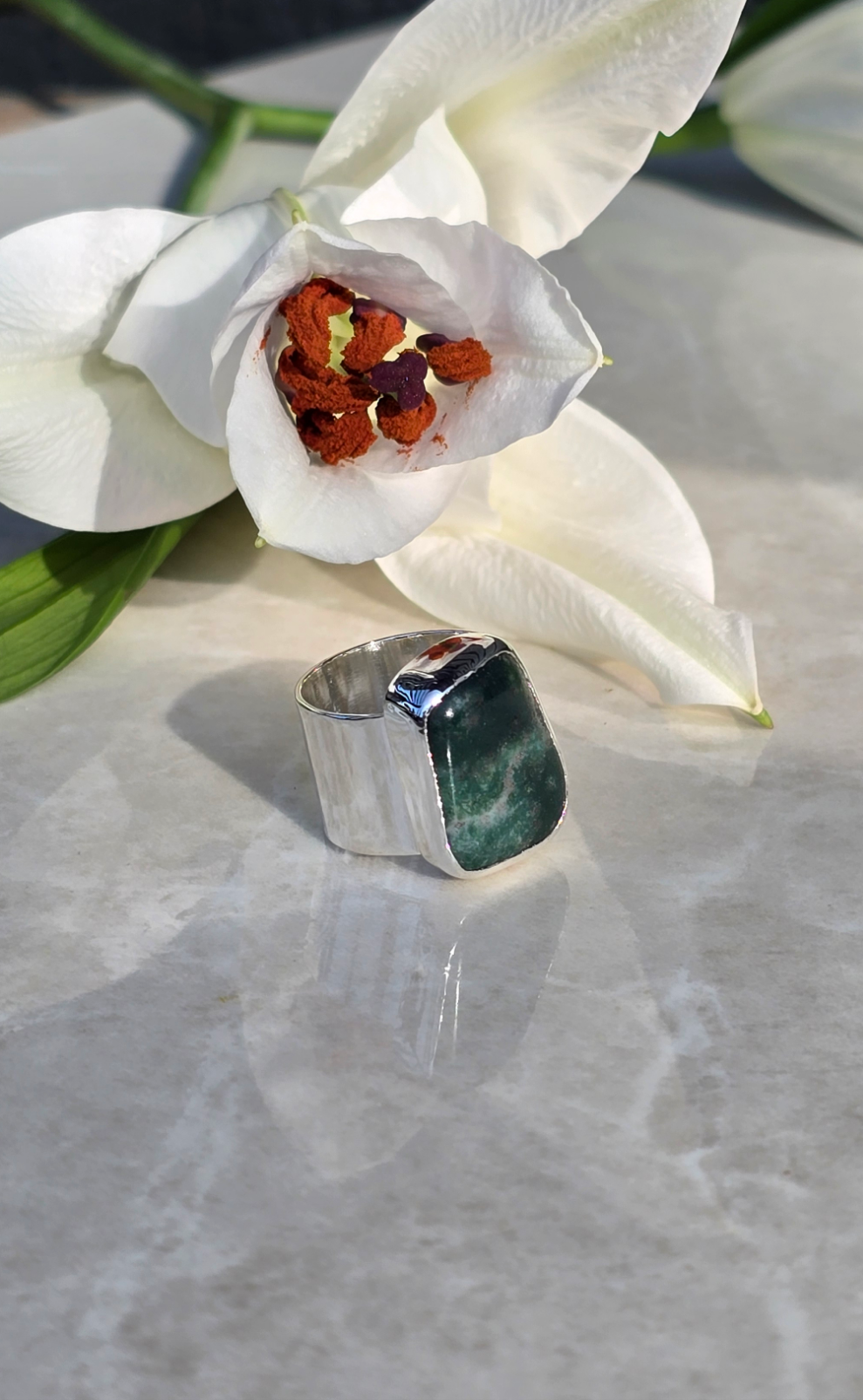 Thick sterling silver band ring with bezel-set tumbled moss agate, size 6.5
