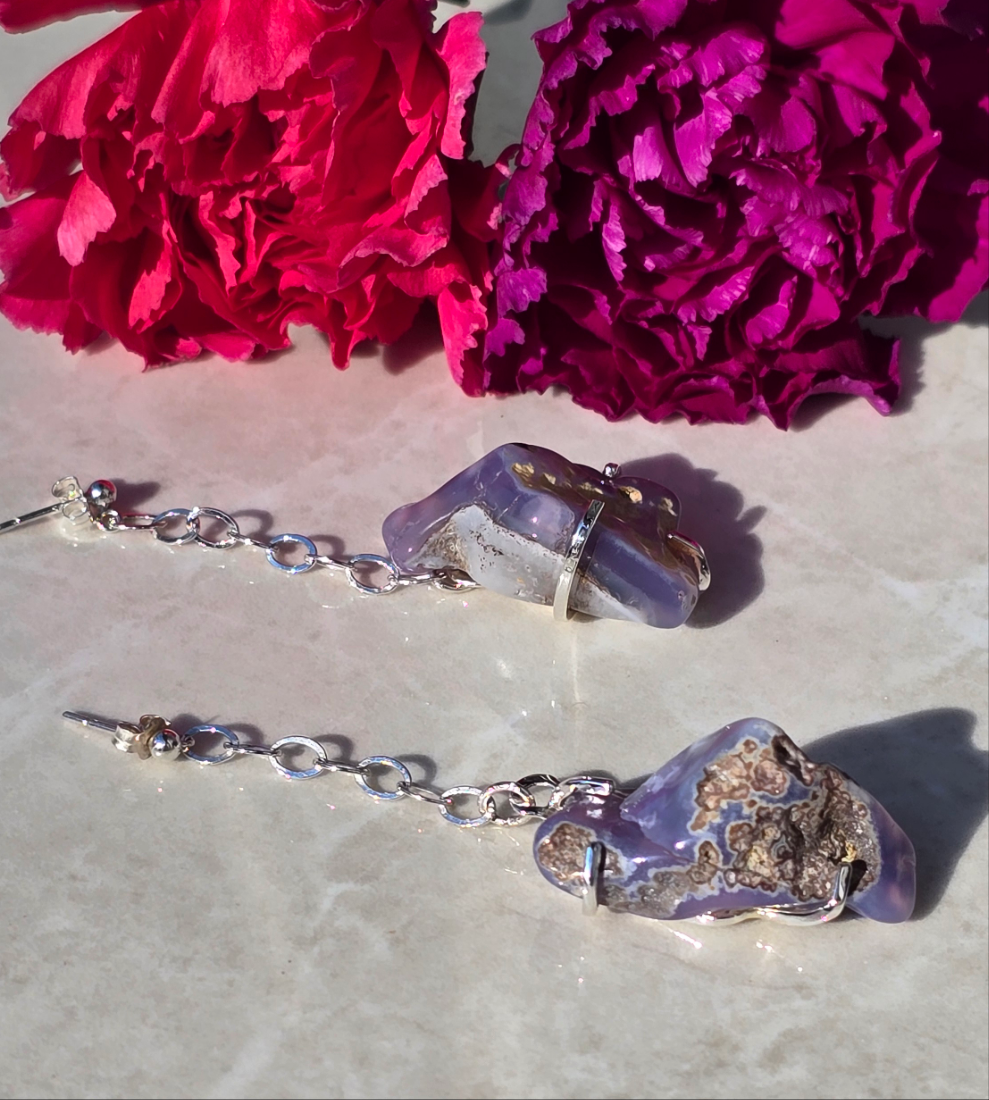 Sterling silver dangle earrings with raw Holly Blue agate stones in prong settings on chain-link drops