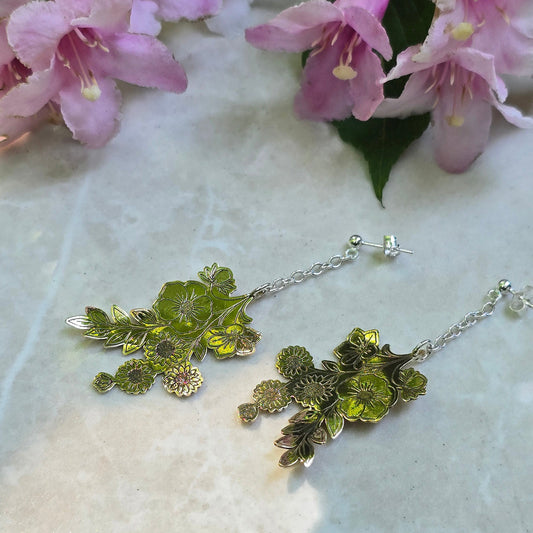Handcrafted wildflower-inspired drop earrings featuring delicate floral elements with a lightweight, organic design that adds subtle movement and botanical elegance